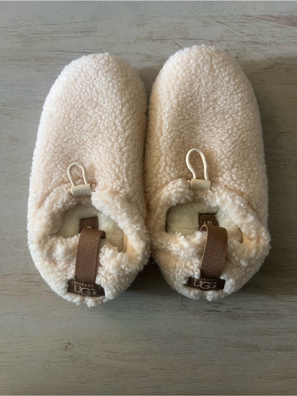 UGG Plushy Slippers in Cream